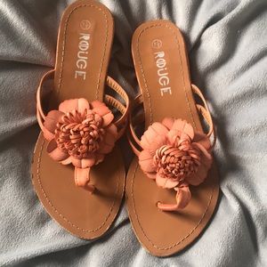 Orange and tan flip-flops